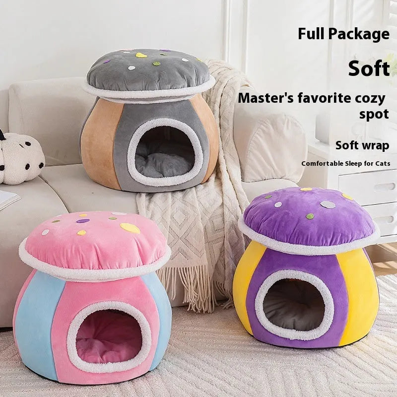 Purple mushroom-shaped cat nest bed with soft plush material and a separate blanket.