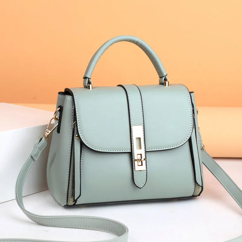 Soft black PU leather women's messenger bag with a single strap, shown in a square vertical shape.