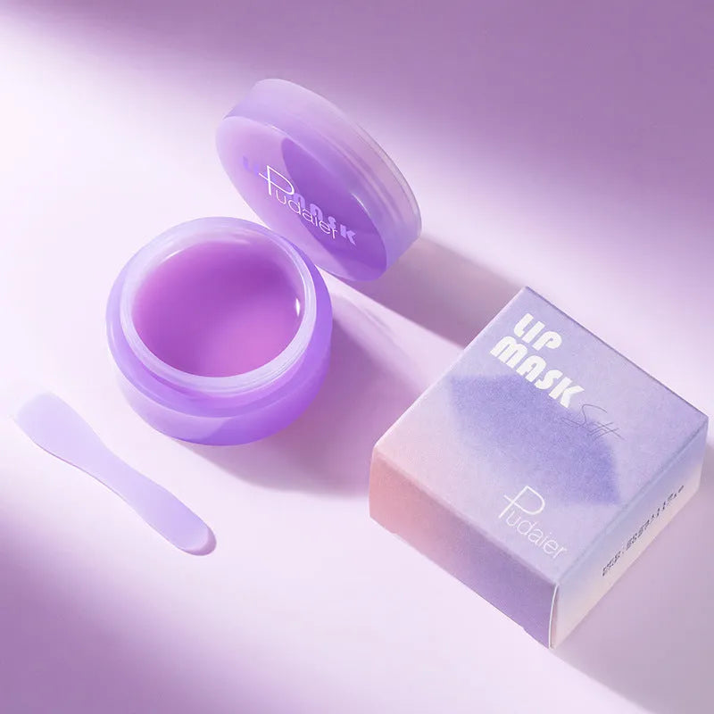 10ml pot of lip balm exfoliating mask and a metal lip scraper tool on a white background.