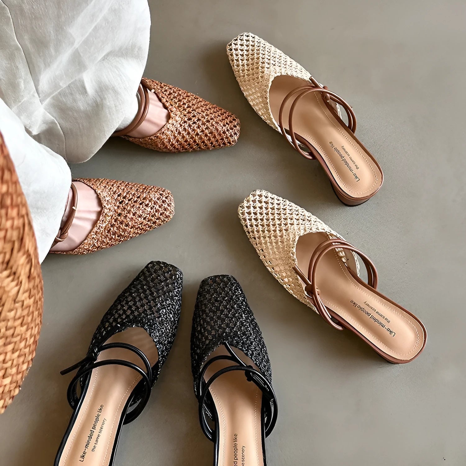 Women's black breathable outdoor slippers with square toe and chunky heel on a rubber sole.