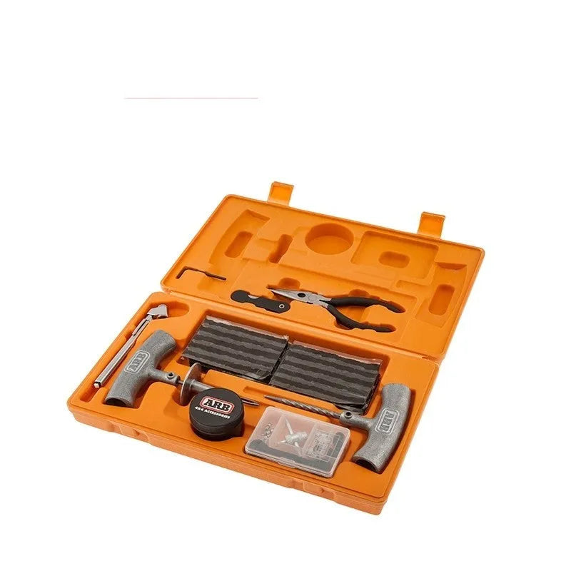 Speedy Seal emergency car tyre repair tool kit open in its high-visibility case, showing pressure gauge, reamer, and insertion tools.