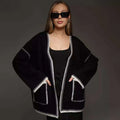 Lace-up knitted cardigan sweater in camel colour with loose fit and long sleeves