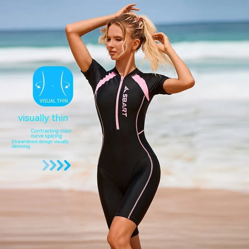 Solid colour one-piece swimsuit with short sleeves and chest padding for women's surfing and swimming.