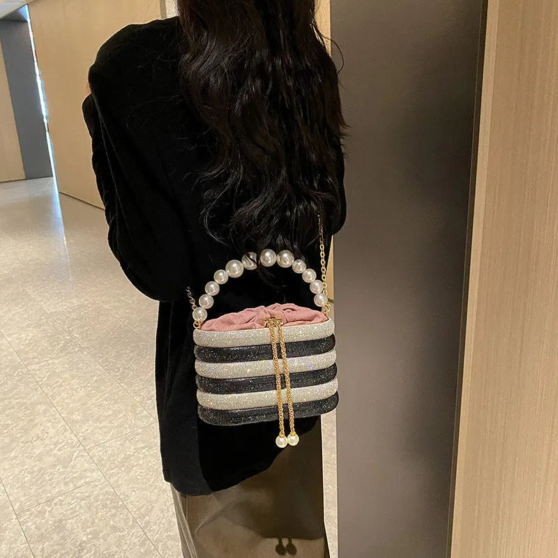 Women's pearl beaded retro evening crossbody bag in black with silver hardware and internal zip compartment