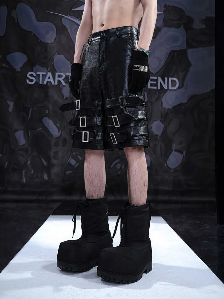 Black men's leather shorts with ring detail and cropped design