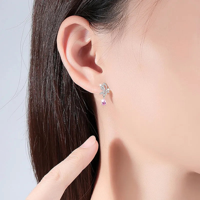 Crystal butterfly 925 silver stud earrings for women on white background