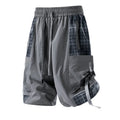 Men's loose cargo shorts with plaid stitching detail in polyester fabric, available in three colour options