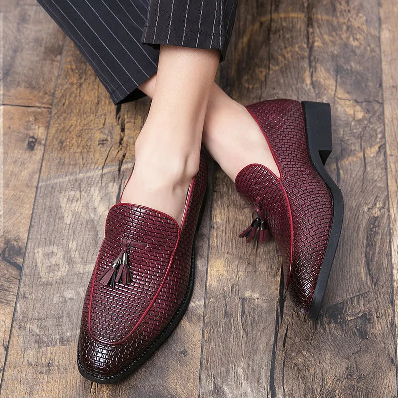 Men's black pointed slip-on shoes with tassel detail on artificial PU upper