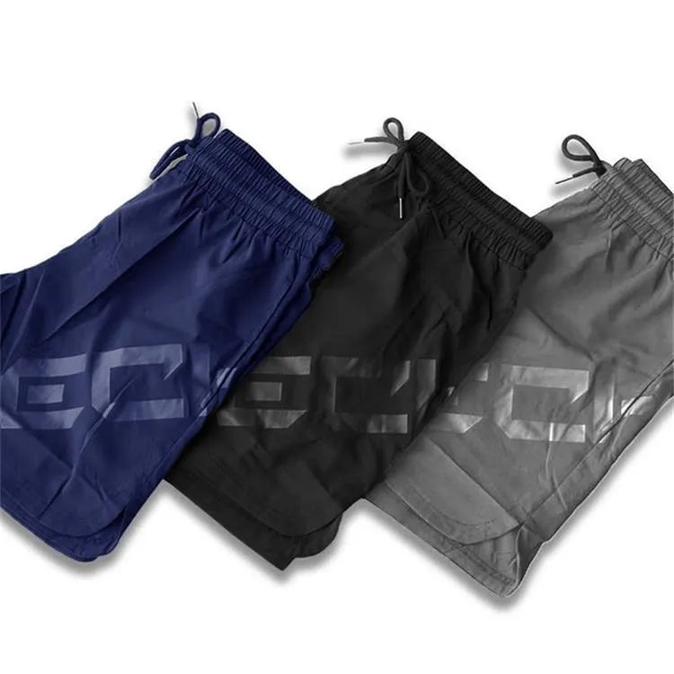 Men's elastic training shorts in quick-drying nylon blend fabric