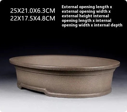 Handmade antique oval bonsai pot in purple sand ceramic measuring 25cm long by 21cm wide