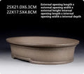 Handmade antique oval bonsai pot in purple sand ceramic measuring 25cm long by 21cm wide