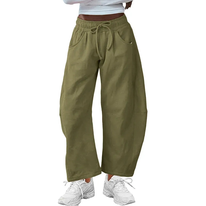 Women's loose cotton cropped sweatpants with drawstring waist and side pockets in multiple colours