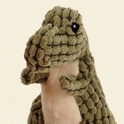 Grey, green, or orange bite-resistant rubber dog toy with sound feature for chewing.