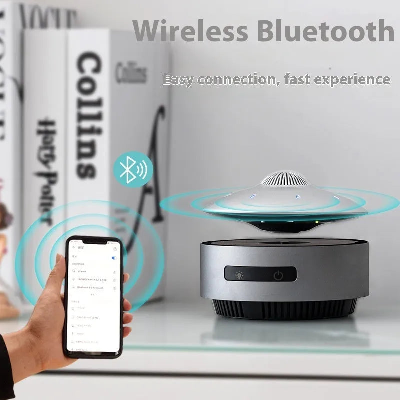 Automatic lifting magnetic levitation Bluetooth speaker with ABS housing showing floating speaker unit above base