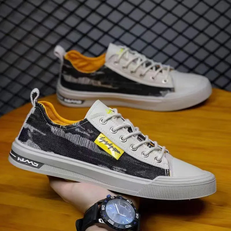 Men's canvas shoes in black, dark blue, and light blue with round toe and rubber sole