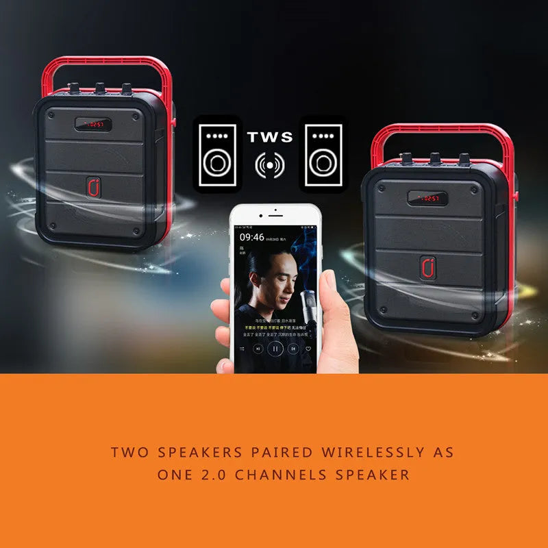 MS62AI portable Bluetooth speaker with wireless microphone on a table, showing remote control and charging cable.