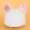 Plush cartoon hat decoration designed to attach to a ski helmet for personalisation
