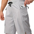 Men's solid colour quick-drying beach shorts in polyester fabric with straight-leg design