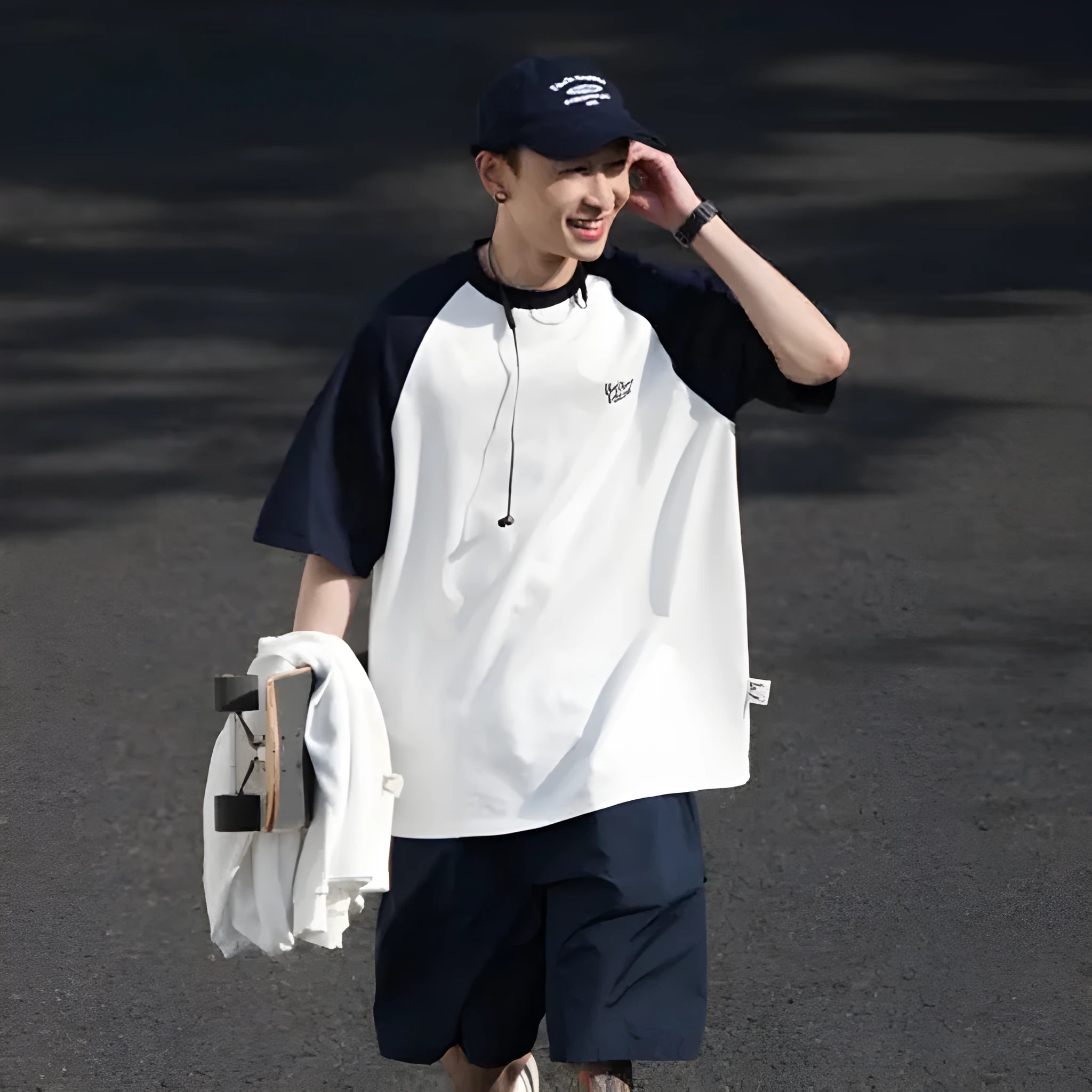 Blue loose-fit men's T-shirt with raglan sleeves in a Japanese Junior casual style.