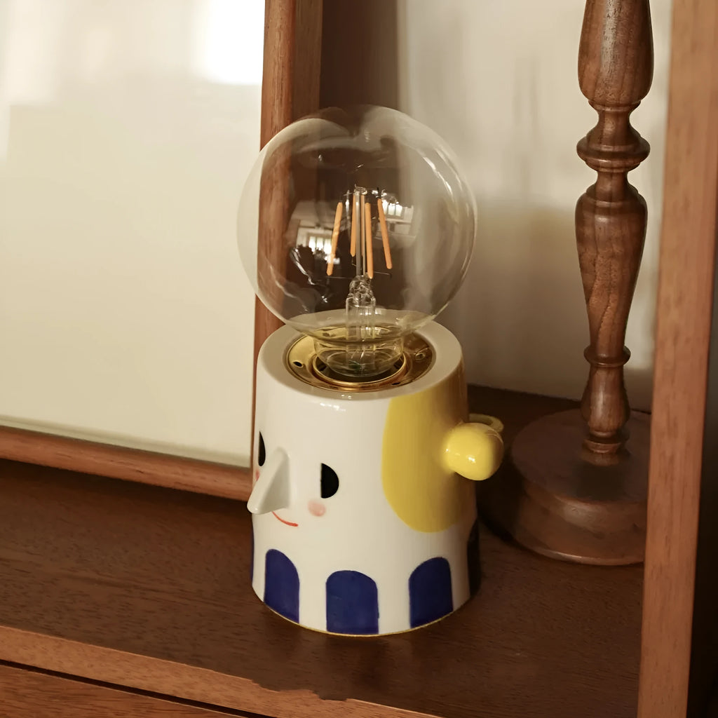 Handmade ceramic lamp with ball headlight design for bedside and decorative lighting