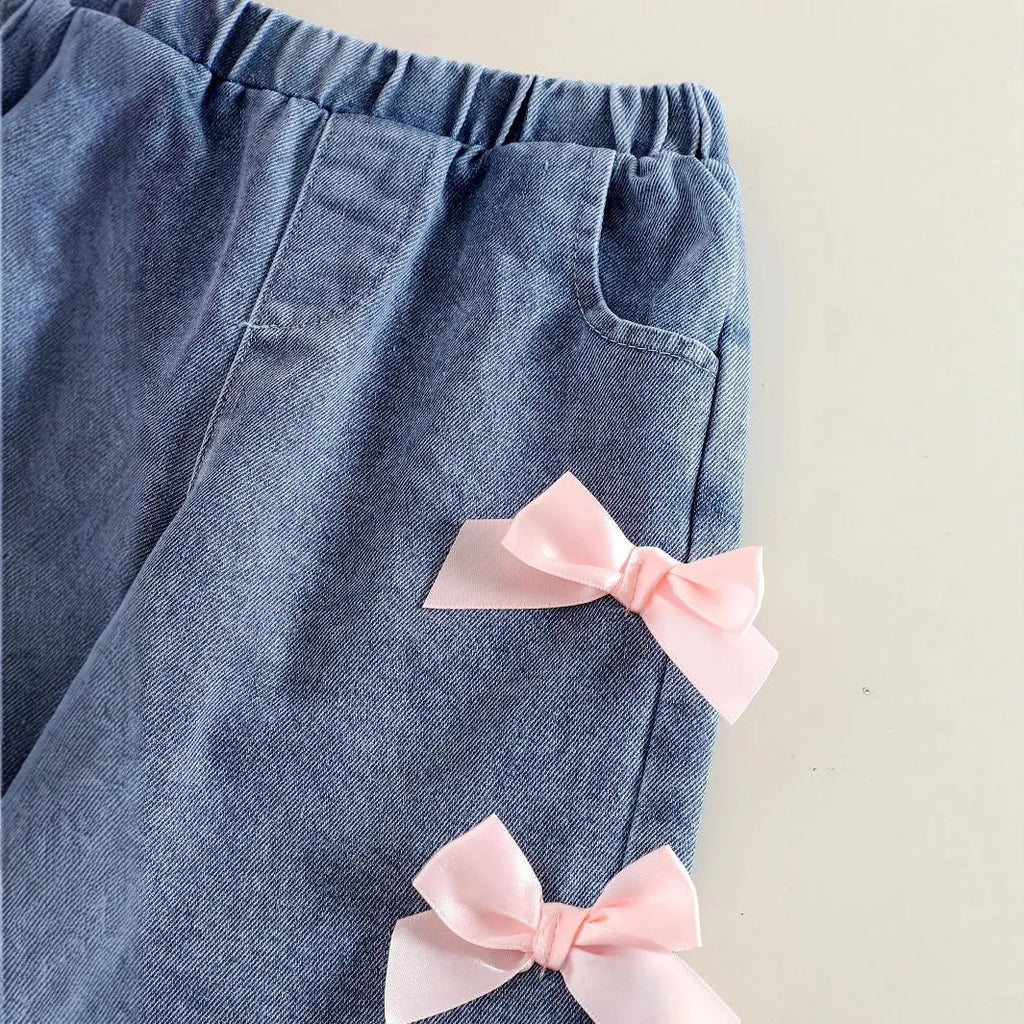 Pink two-piece baby girls outfit with long-sleeved sweater and trousers in cotton