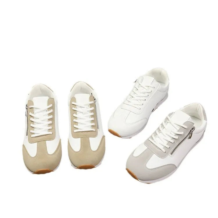Women's flat-heeled ballet pumps in grey, white, and champagne with a PU upper and rubber sole.