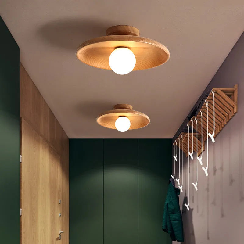 Modern solid wood ceiling lamp with glass shade in light wood and walnut colour finishes.
