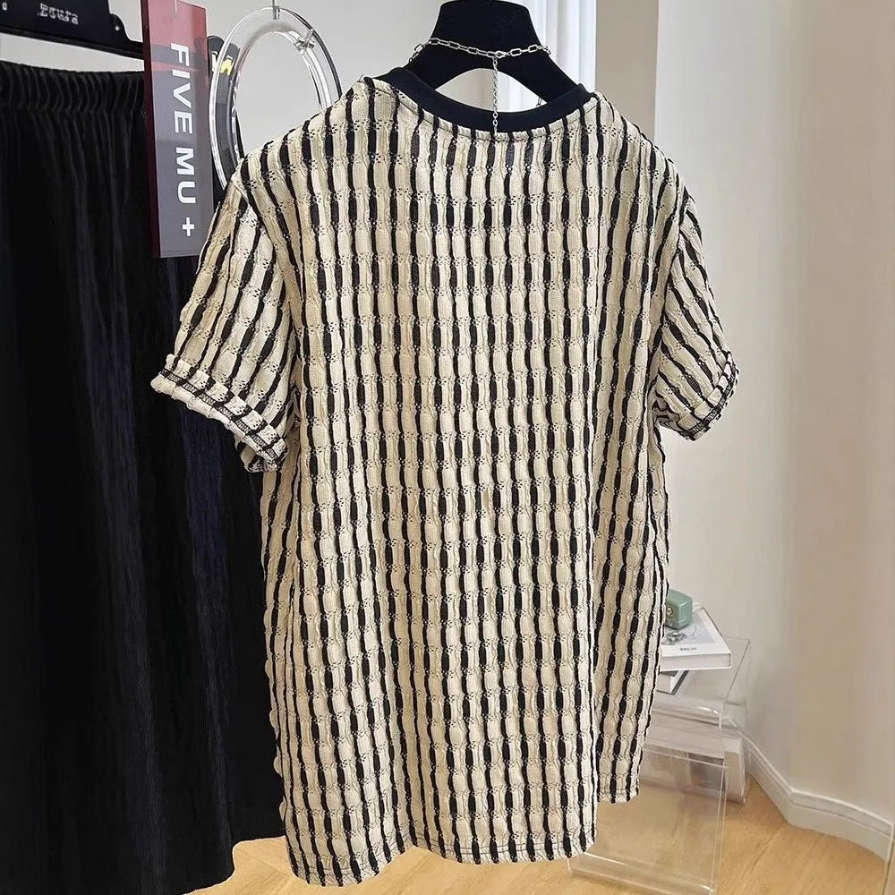 Black striped men's casual loose-fit short sleeve shirt made from a linen and silk blend fabric.