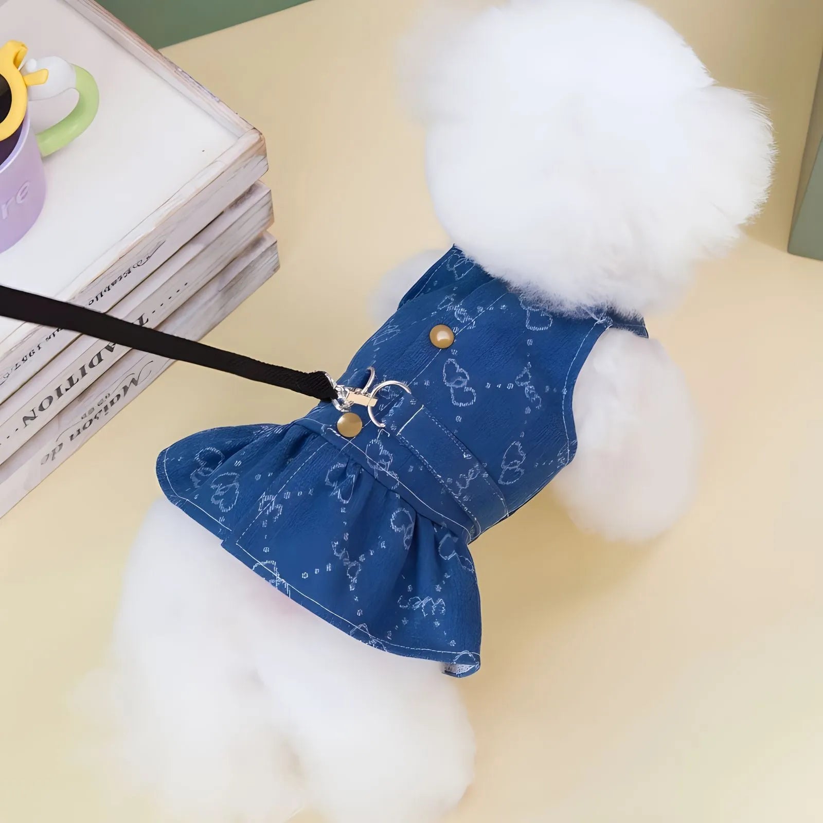 Teddy Bichon dog wearing denim princess dress with bracket design for spring and autumn seasonal wear