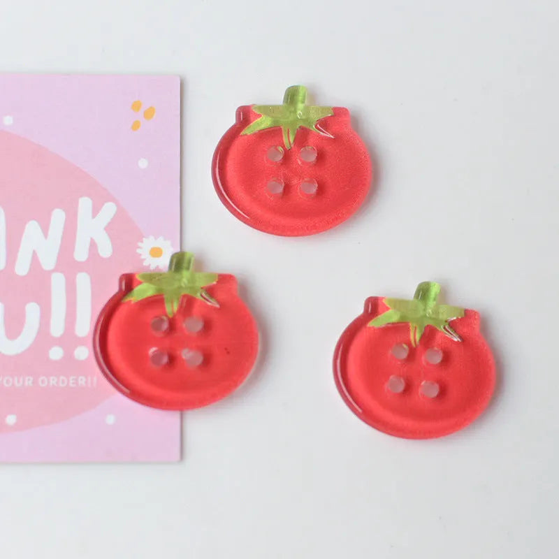 Tomato button ornament made of plastic or resin with printed pattern in medium size mixed colours