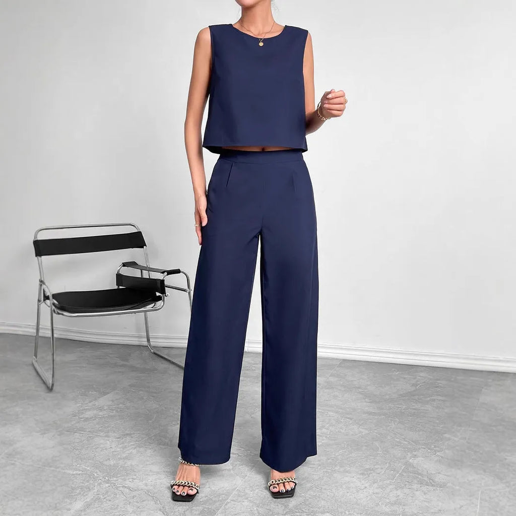 Women's red polyester two-piece set with sleeveless top and wide-leg trousers