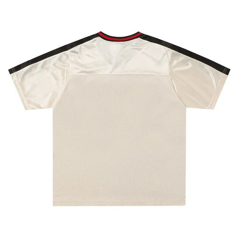 Apricot coloured V-neck sports jersey with letter patterns and drop-shoulder sleeves