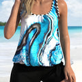 Blue tie-dye floral pattern women's bikini set with top and shorts for plus sizes.