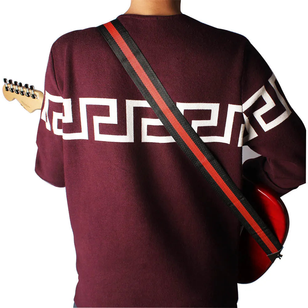 Adjustable woven guitar strap showing length adjustment and five colour options