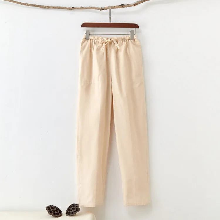 Men's solid colour pure cotton coarse fabric casual pants in beige with drawstring waist and mid rise