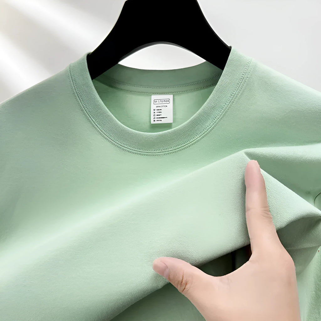 Men's drop shoulder solid colour cotton T-shirt in white, front view, short sleeves, relaxed fit