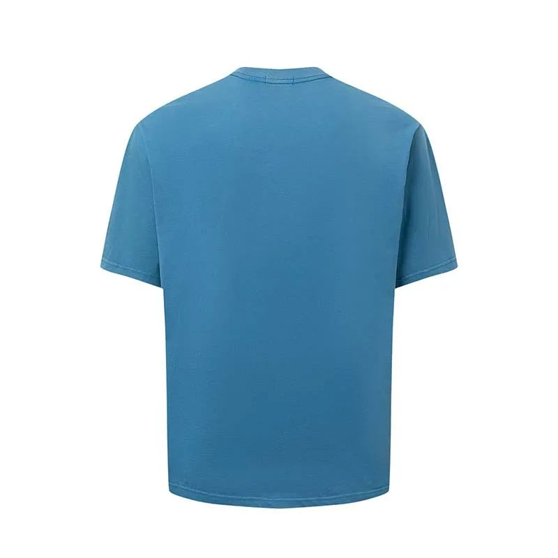 Men's blue cotton blend t-shirt with printed letter design showing loose fit and round neck