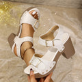 Women's plus size buckle high heel sandals in black colour with rivet detail