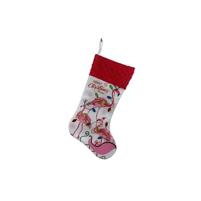Flamingo patterned cloth Christmas stocking hanging decoration measuring 46 by 28 centimetres