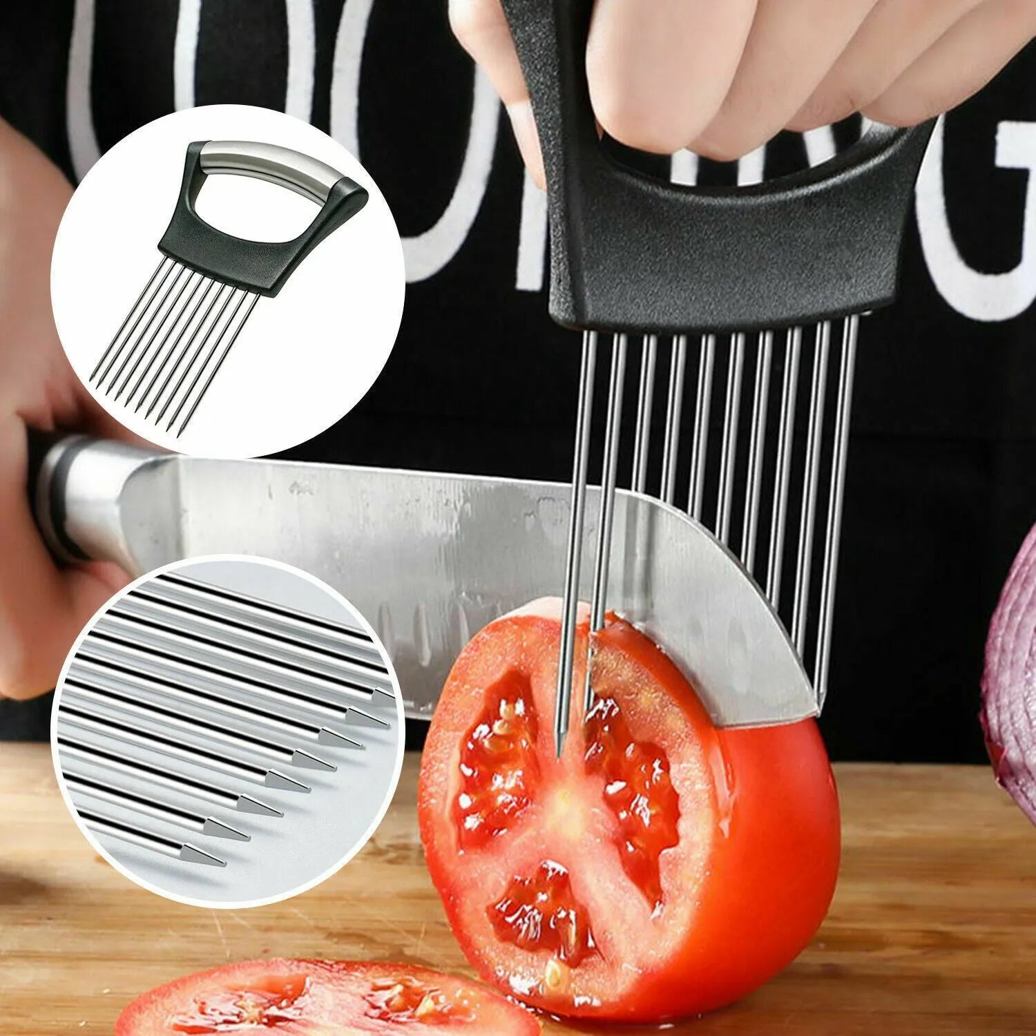 Stainless steel onion holder slicer with non-slip base on a kitchen counter next to a tomato and knife
