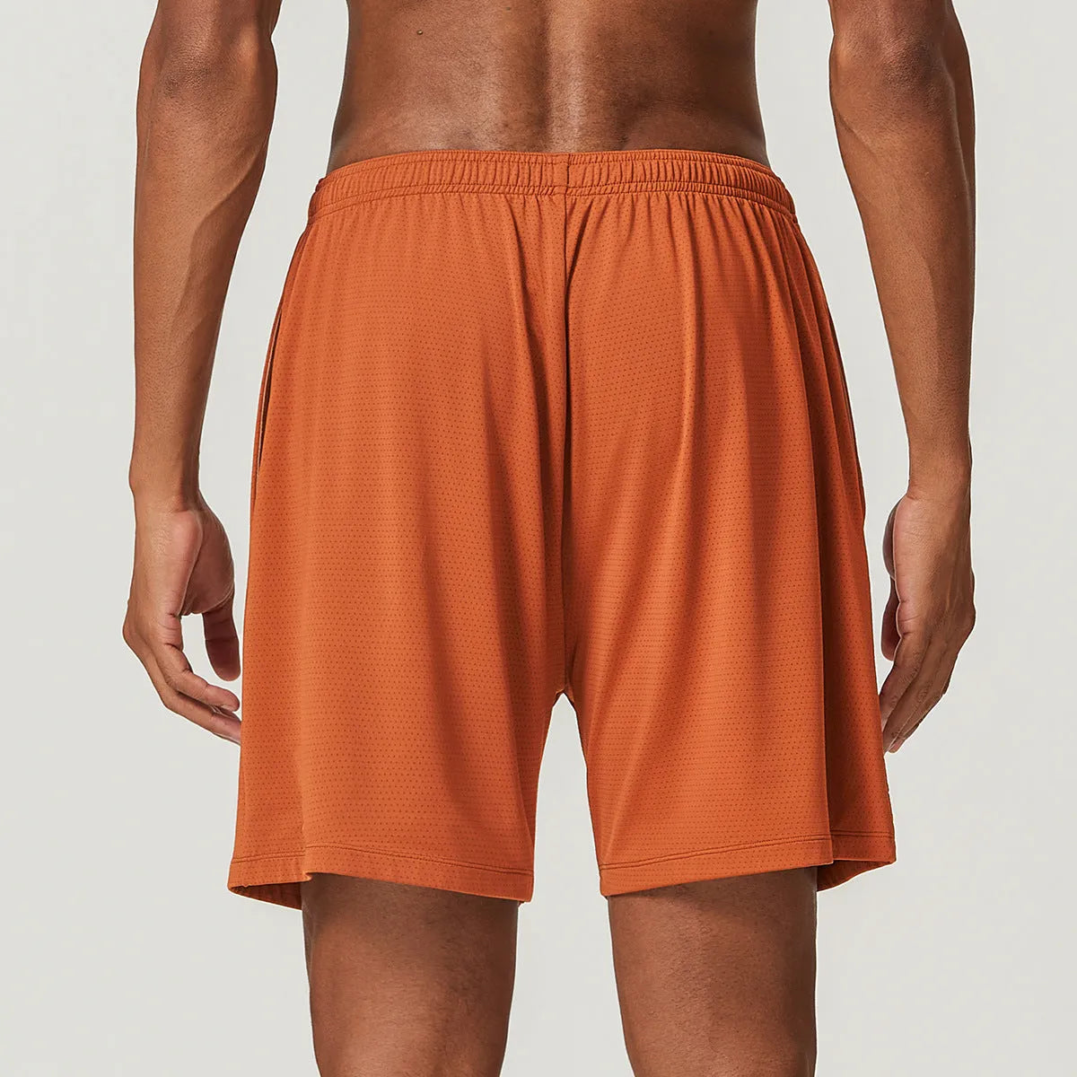 Men's quick-dry double-layer running shorts in multiple colours on a size chart.