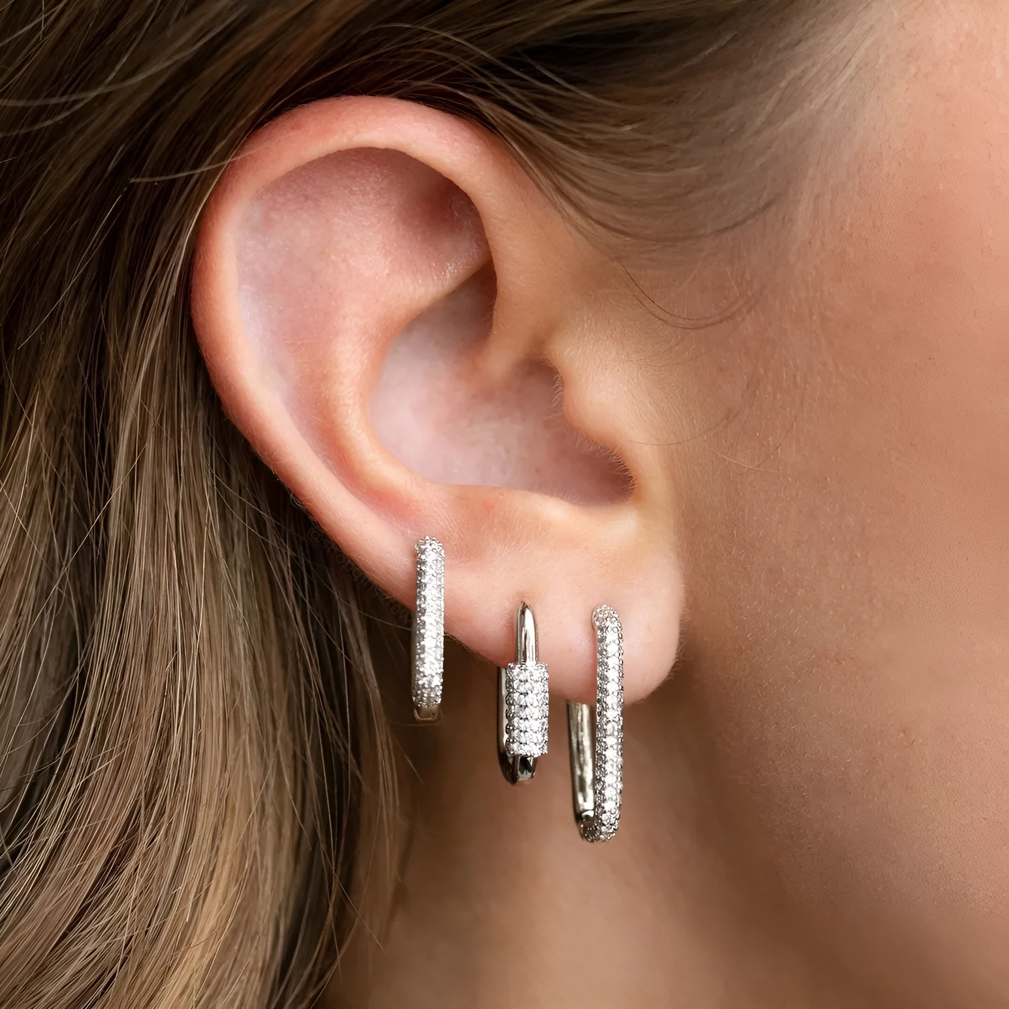 Geometric three-piece ear clip set with micro inlaid zircon detailing on copper in gold and white colour options