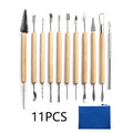 11-piece clay tools set with wooden handles and stainless steel tips displayed on a surface with a blue storage bag
