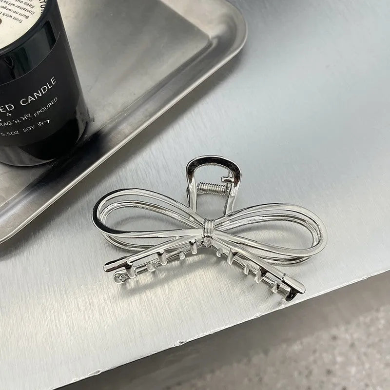 Alloy bow barrette for women silver colour back head hair grip clip