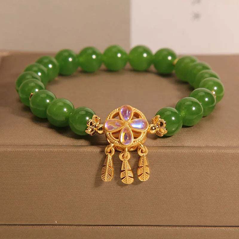 Women's green jasper bracelet with four-leaf clover and dream catcher crystal pendant