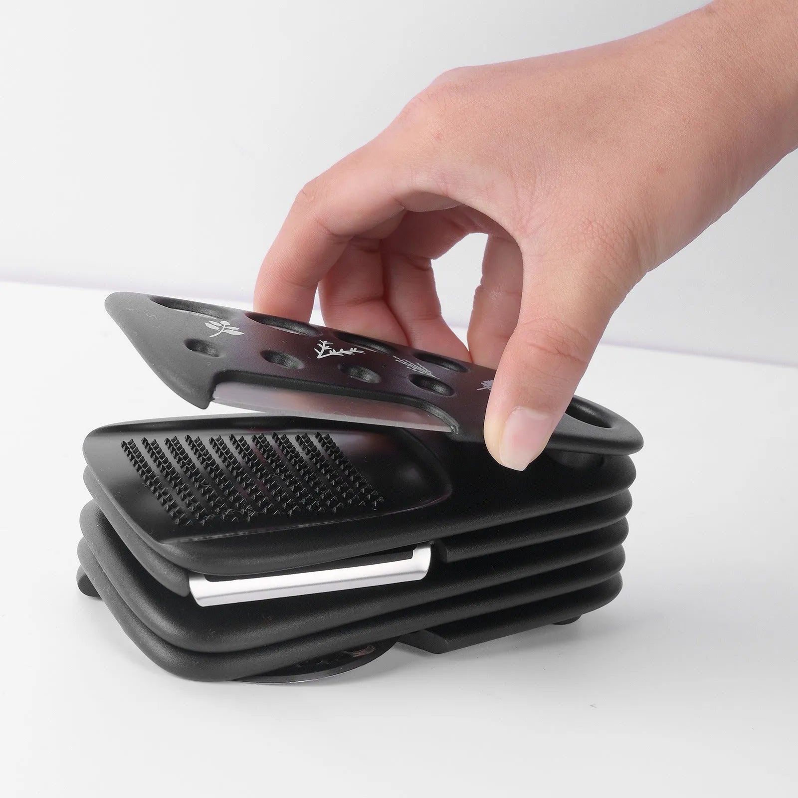 Six stacking kitchen gadgets with stainless steel heads and PP handles stored in a colour box with a brush