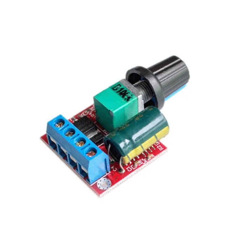 Small green PCB DC motor governor with black potentiometer knob for 5V-35V speed control