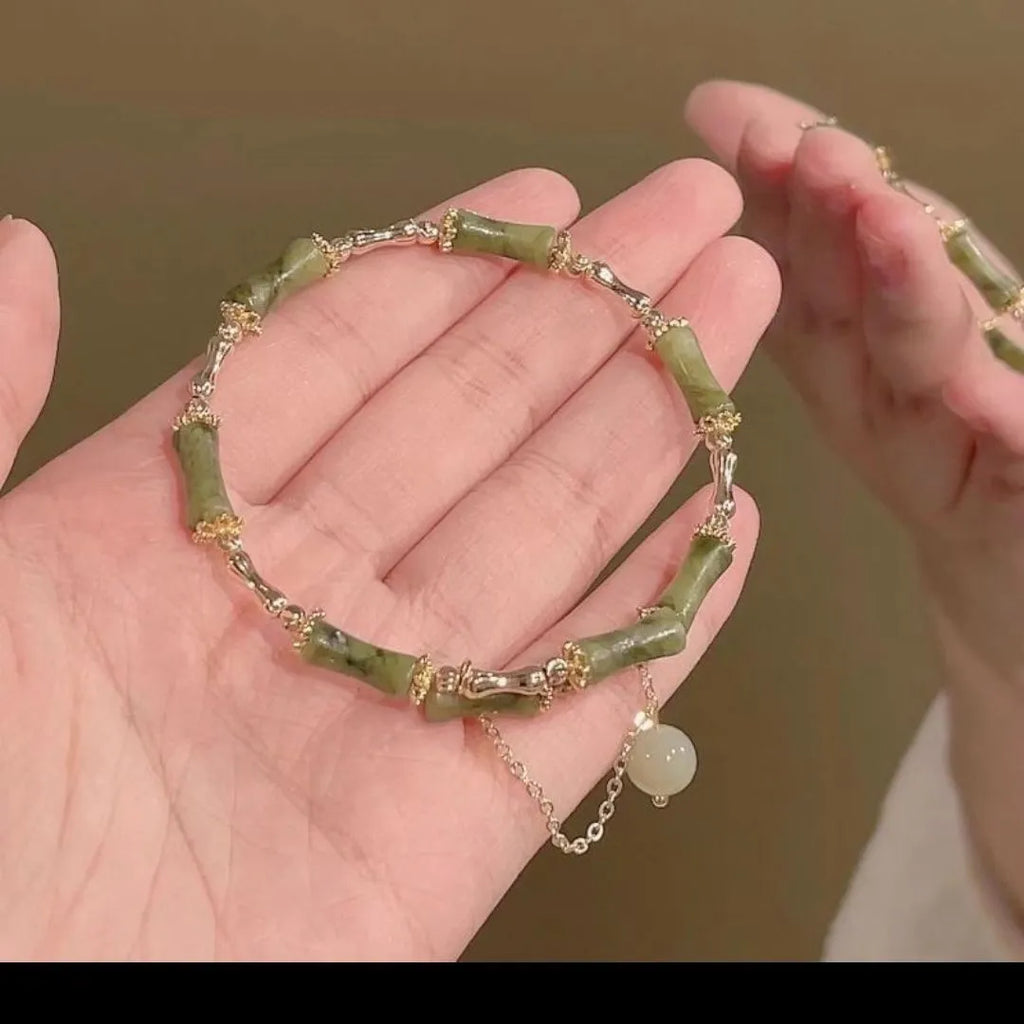 Women's bamboo joint coloured glaze bracelet with baking varnish finish in plum wine colour