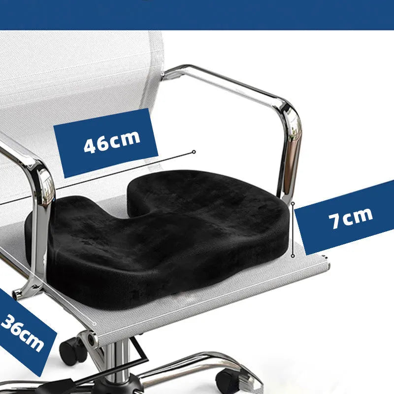 Black flannel U-shaped memory foam seat cushion for office chairs, 46cm by 36cm.