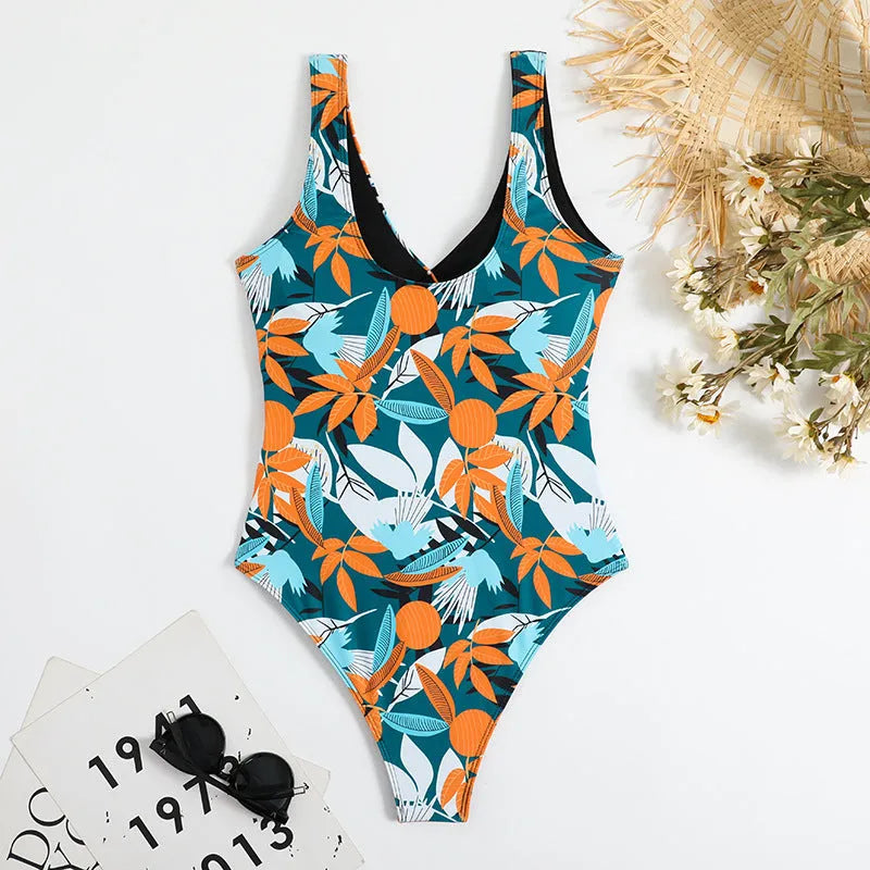 High-waist one-piece swimsuit with printed pattern in white or black colour options